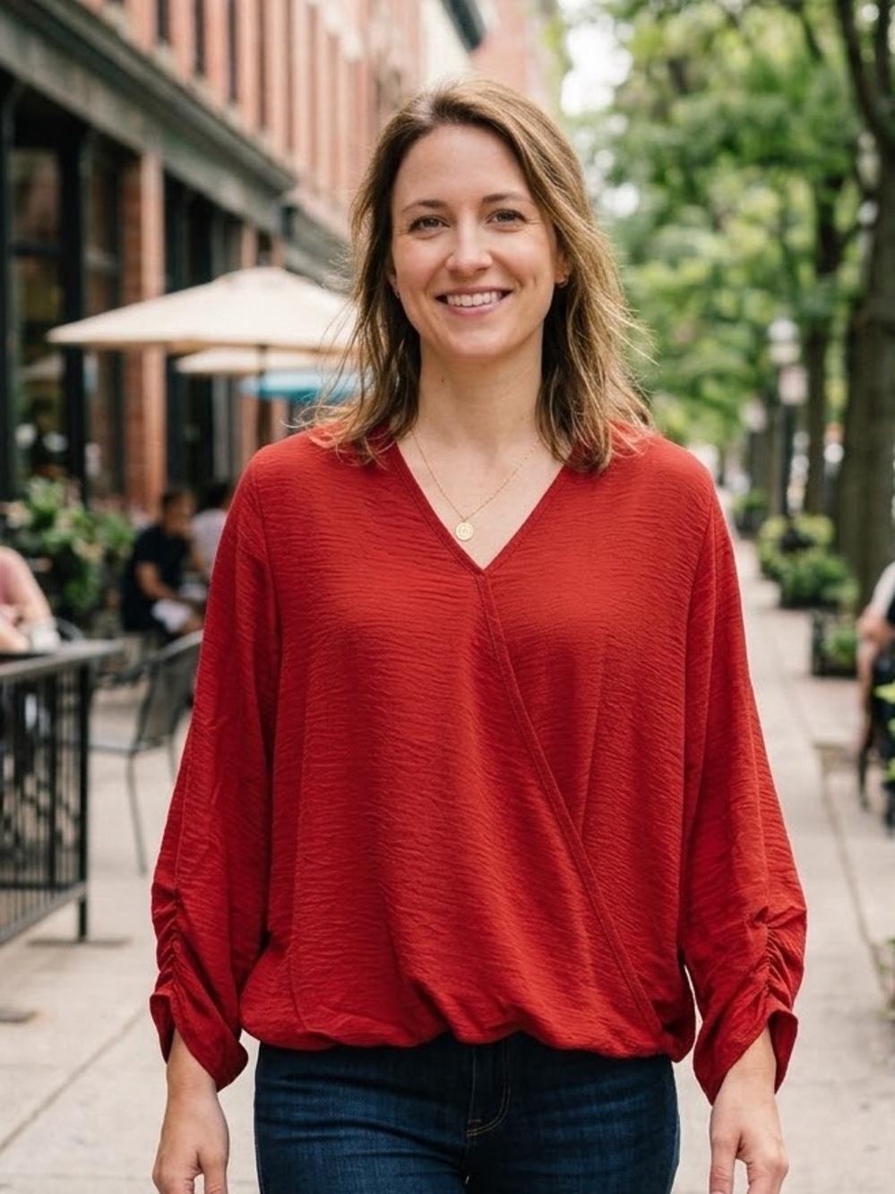 Entro Dolman style long-sleeve blouse featuring a faux-wrap surplice neckline